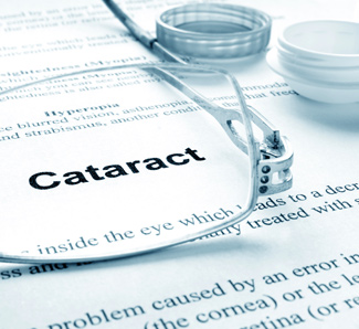 Document about cataracts with glasses resting on it