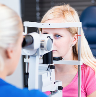person receiving an eye exam