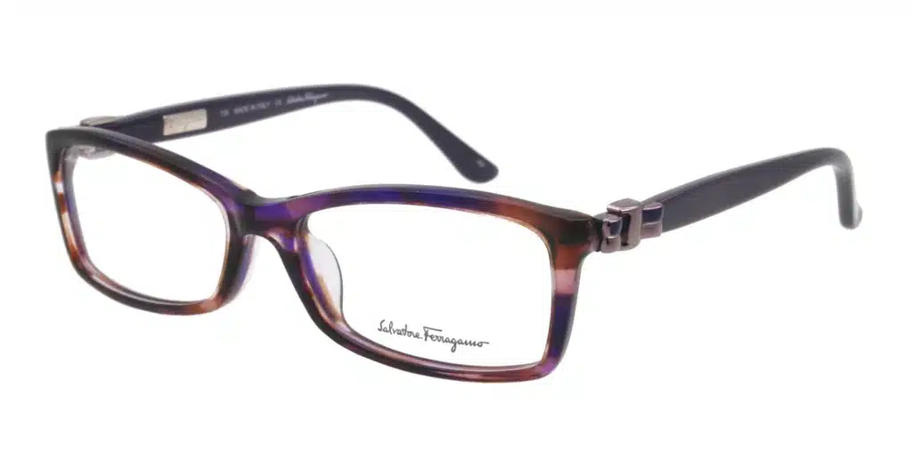 A pair of Salvatore Ferragamo eyeglasses with almost opague purple and brown rims and black temples.