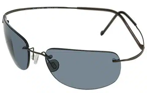 A pair of frameless wrap-around Maui Jim eyeglasses. Gray lenses, thin black temples.
