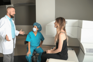 A doctor discusses LASIK safety protocols in a consultation room, ensuring informed decision-making.