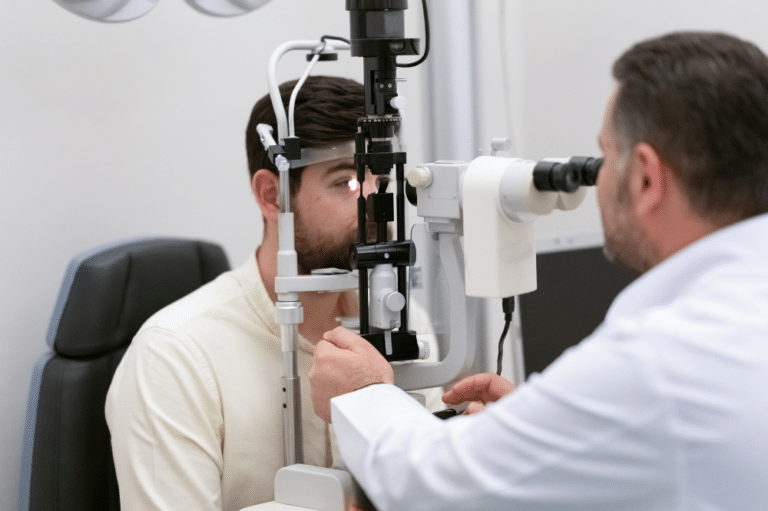 A beared man getting a glaucoma screening by an optometrist in Boise.